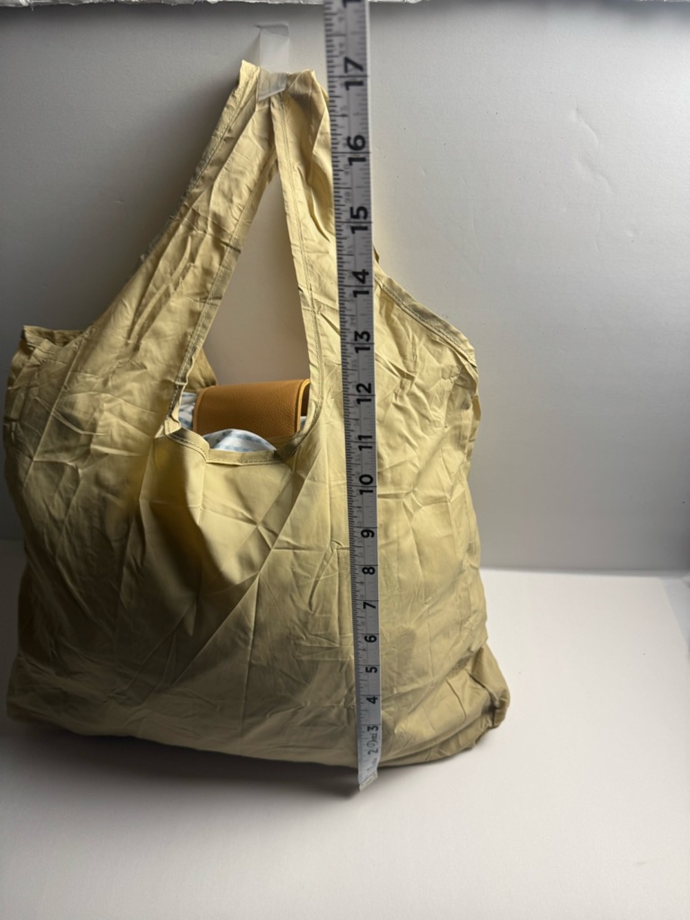 A foldable tote bag charm with carabiner clasp for easy use of reusable bag. - Picture 6 of 7